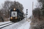 6351 & 6302 pick up speed as they roll downhill with Z127 past the south end of Clyde siding